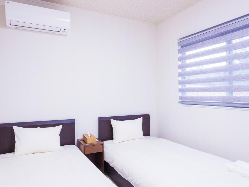 Kariyushi Condominium Resort Nago Rb Villa Nakijin Bagian luar foto
